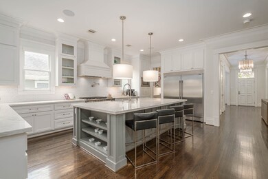 kitchen features an open floor plan centered aroun