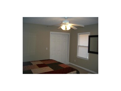 Master Bedroom has large closet and ceiling fan.