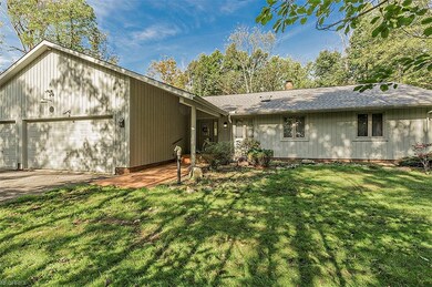Beautiful front porch and 3 car garage!