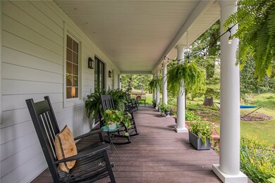 Beautiful covered front porch perfect for watching