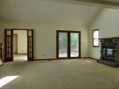 View from foyer of Vaulted Great Room with skyligh