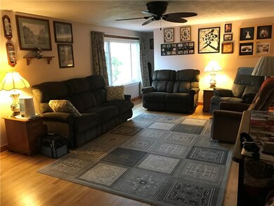 Hardwood Flooring in this Spacious Family Room
