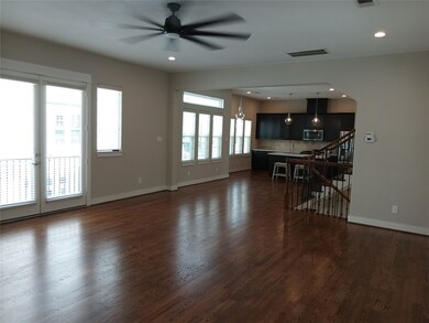 View of the living room to the dining room and the