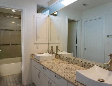 En-suite Primary bath with dual vanity.