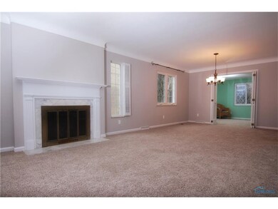 Living-Dining El with Fireplace with mantle and ma