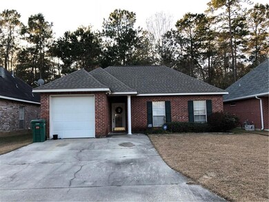 Double car driveway with single attached garage.