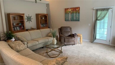 Living room with light carpet