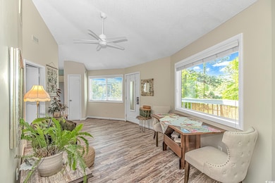 Sitting room featuring visible vents, baseboards, 