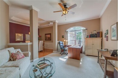 Large formal living - 10' ceilings w/ crown, adjac