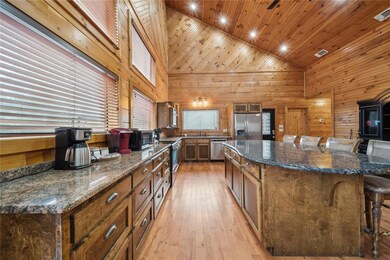 Kitchen with stainless steel appliances, a large i