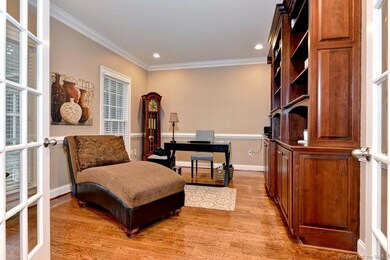 beautiful home office with cherry built in cabinet