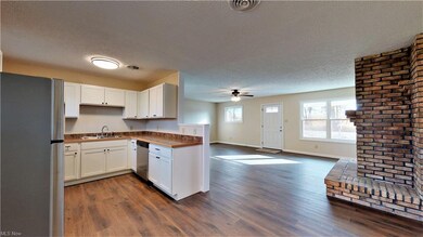 Seller open the kitchen into the living room and d