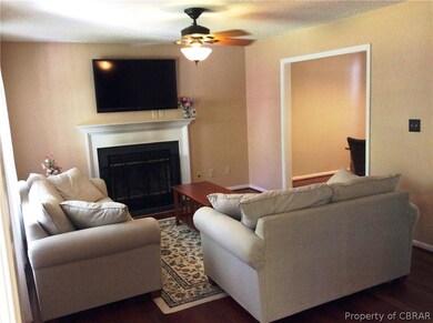 You'll love the cozy living room with fireplace.