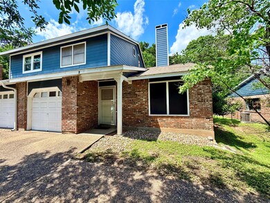 View of front of property featuring brick siding,