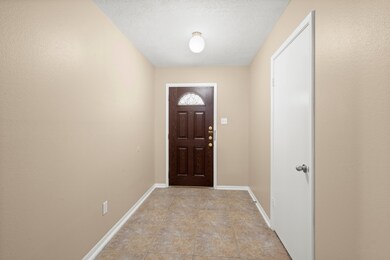 Large entry with extra wide hall ways.