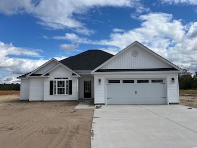 Single story home featuring a garage