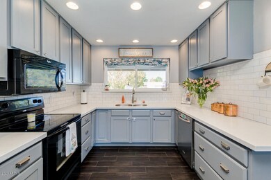 updated kitchen overlooking front yard