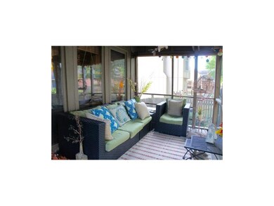Cozy screened-in porch to enjoy the treed backyard