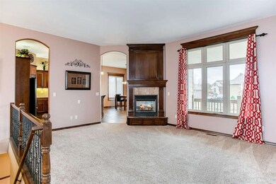 Note the focal 2-way gas fireplace and the expansi