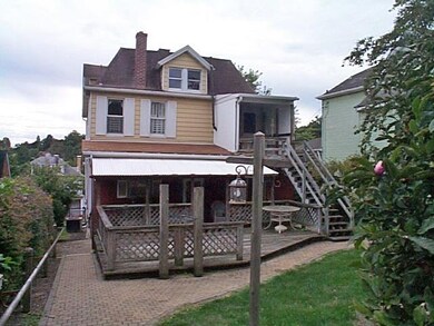 The yard is entirely fenced in the back and sides.
