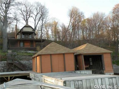 Exterior Front. 2 boat houses and protected deep w