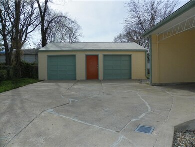 Lots of driveway space, storage space and garage s