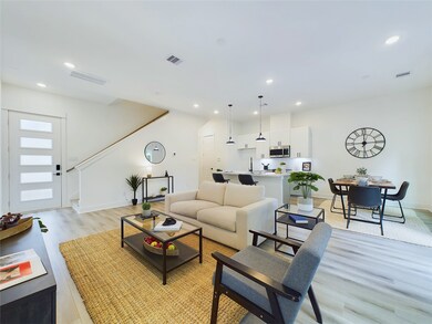 Open concept kitchen, dining, and living - ideal f