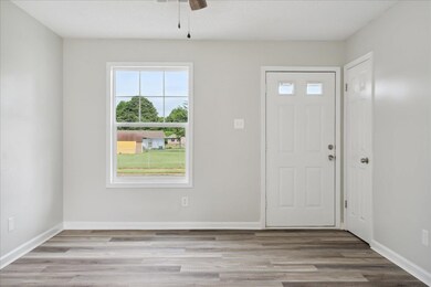 Entryway featuring hardwood / wood-style floors, a