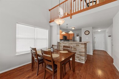 Breakfast room, kitchen & great room with wood lam