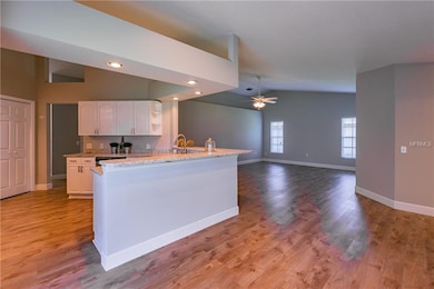 Kitchen that overlooks the breakfast nook as well 