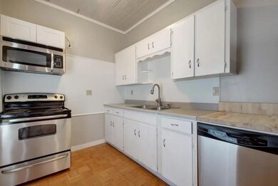 Kitchen featuring a sink, appliances with stainle