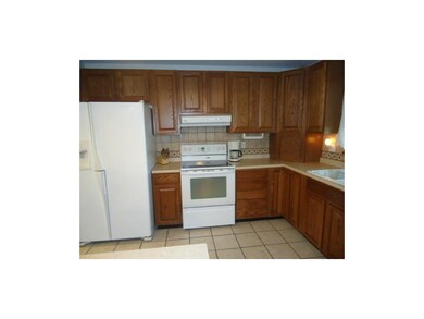 Beautiful Kitchen with Tile Floor and Tile Backspl