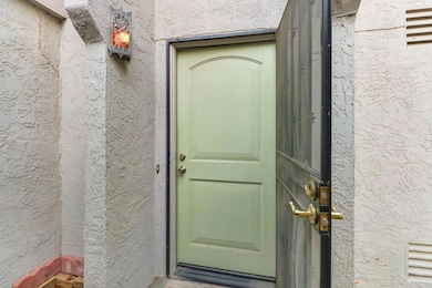 The entry door also has a metal security door.