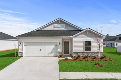 View of front facade featuring a garage and a fron