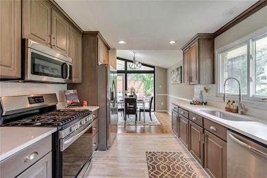 Kitchen with Quartz Counter Tops and All Stainless
