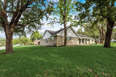 View of home's exterior with a yard