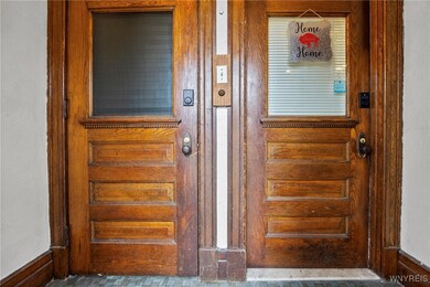 Enclosed front entryway to each unit