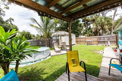View of yard with a fenced in pool