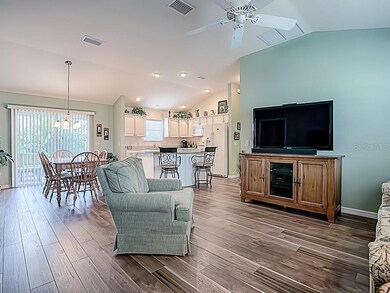 LOVELY OPEN LIVING AREA ENJOYS NATURAL LIGHT FROM 