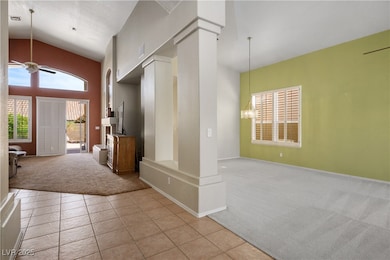 Foyer entrance featuring light tile patterned floo