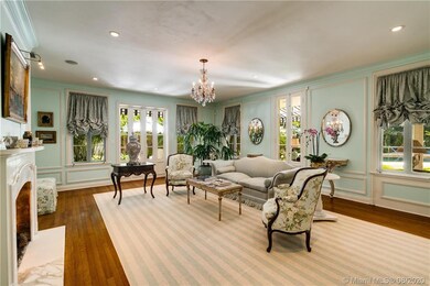 Elegant hardwood floors and fine millwork punctuat