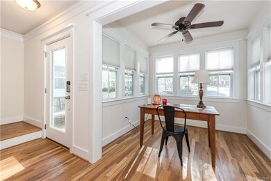 Beautiful hardwood floors and lots of windows and 