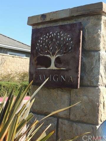 Home is located in gated community of Lavigna.