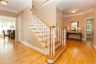 Welcoming two story foyer is highlighted by glowin