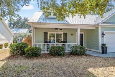 View of front of home featuring ceiling fan and co