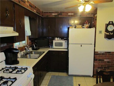 Kitchen. The stove, as well as a HSA Home Warranty