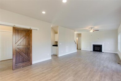 Kitchen Opens to the Family Room w/Gas Log Firepla