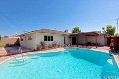 Glistening pool and spa with room to entertain.