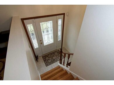 Entry/Foyer. Ceramic tile entry reveals rich hardw