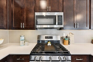 Kitchen featuring appliances with stainless steel